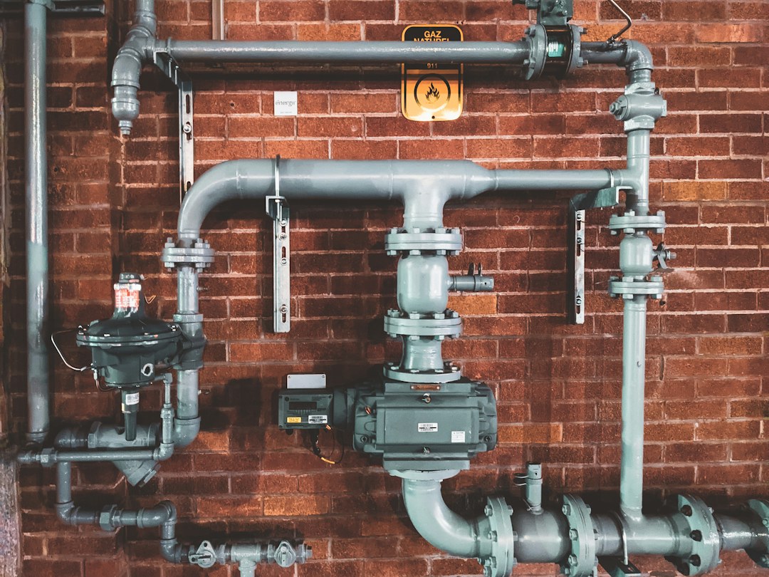 Exposed plumbing pipes illustrating burst pipe and water leak repair